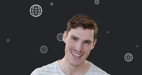 Man Smiling Against Digital Globe Background Illustrating Global Connectivity