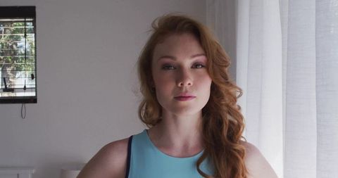 Confident Woman in Minimalist Living Space Environment