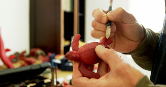 Person Carving a Small Turtle Sculpture with Precision - Download Free Stock Images Pikwizard.com