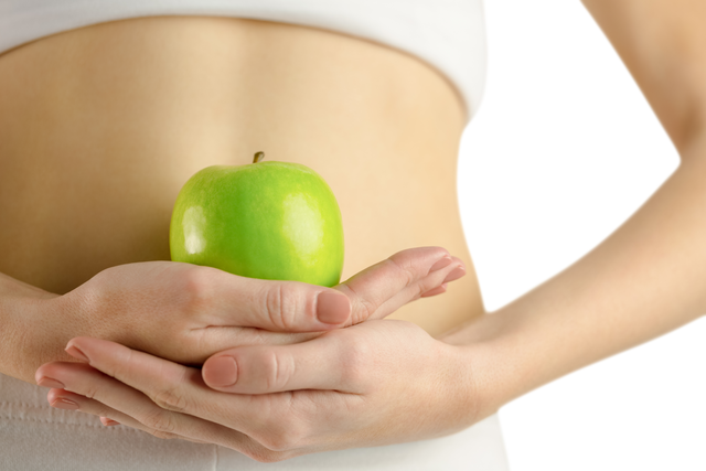 Transparent Concept of Healthy Living - Slim Woman Holding Green Apple - Download Free Stock Videos Pikwizard.com