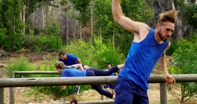 Competitive Team Participating in Outdoor Obstacle Course - Download Free Stock Images Pikwizard.com