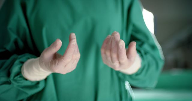 Doctor Wearing Sterile Gloves and Surgical Gown in Operation Room - Download Free Stock Images Pikwizard.com