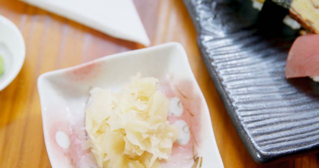 Close-Up of Fresh Pickled Ginger on Ceramic Plate - Download Free Stock Images Pikwizard.com