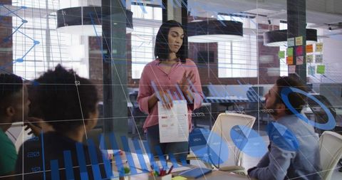 Businesswoman Presenting Data in Modern Office with Digital Overlay