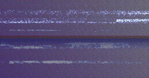 Featuring abstract static interference with digital noise and distortion over a purple background, this visual captures the essence of glitch art and retro digital aesthetics. Ideal for use in projects related to technology, modern art, and digital design, this image evokes a sense of vintage television styles or experimental media art.