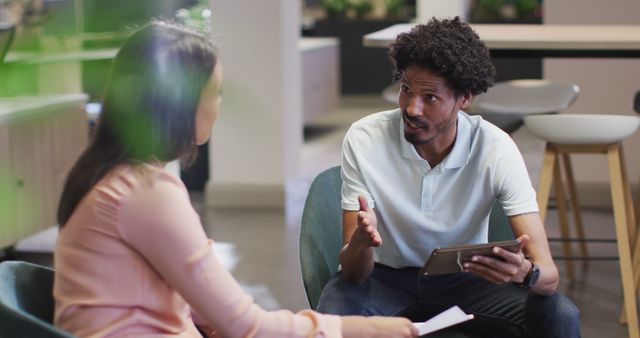 Two Colleagues Having a Discussion During Work Meeting - Download Free Stock Images Pikwizard.com