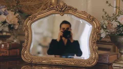 Photographer Capturing Self in Ornate Gilded Mirror at Vintage Dressing Table