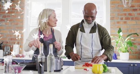 Couple Preparing Meal in Modern Home Kitchen Together