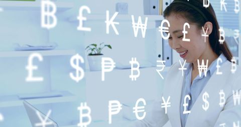 Asian Businesswoman Using Laptop with Overlay of Global Currency Symbols