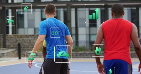 Urban basketball players dribbling green ball with eco icons promoting sustainability