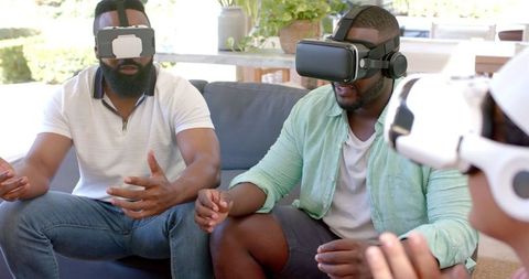 Diverse Group Enjoying Virtual Reality Experience Together