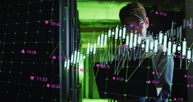 Data Analyst Studying Financial Graphs in Server Room - Download Free Stock Images Pikwizard.com