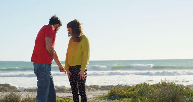 Couple Relaxing on Beach on Sunny Day - Download Free Stock Images Pikwizard.com