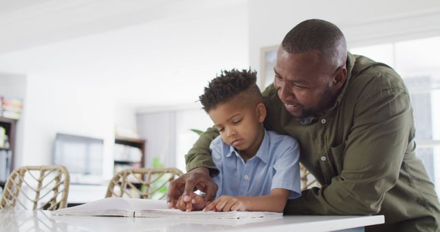 Father Helping Child with Homework at Home - Download Free Stock Images Pikwizard.com