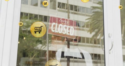 Shop Closed Sign on Cafe Door with Overlay of Shopping Cart Icons