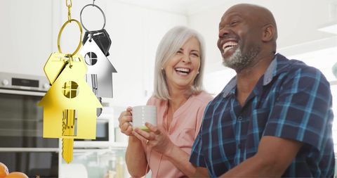 Happy Diverse Couple Celebrating Home Ownership in Kitchen - Download Free Stock Images Pikwizard.com
