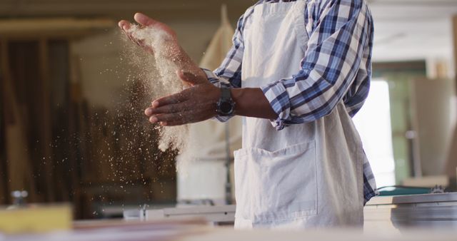 Male Baker Dusting Flour Off Hands in Bakery Artisan Craftsmanship - Download Free Stock Images Pikwizard.com