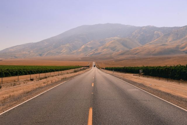 Empty Road Leading to Mountain with Clear Sky Background in California - Download Free Stock Photos Pikwizard.com