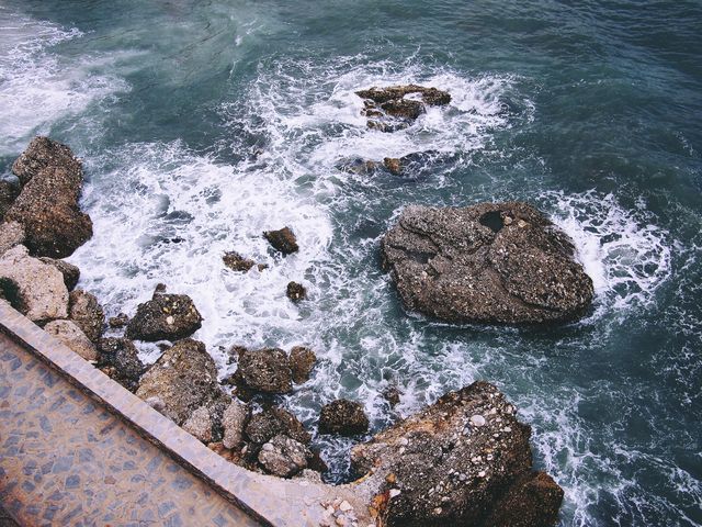 Aerial View of Rocky Ocean Shoreline with Crashing Waves - Download Free Stock Photos Pikwizard.com
