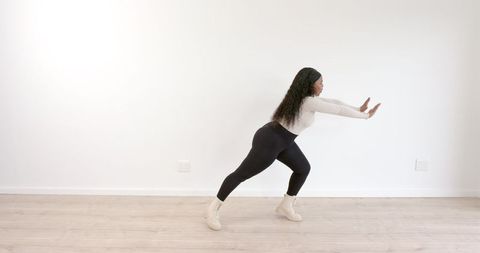 Woman Stretching Leg in Sportswear Ready for Workout