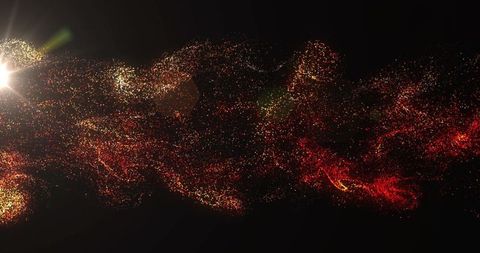 Glittering red and gold particle ribbon flowing across black space with left lens flare