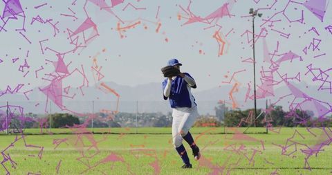 Hispanic baseball player catching ball amidst colorful rodrigues