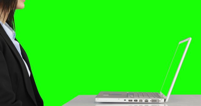 Businesswoman Using Laptop with Green Screen Background - Download Free Stock Images Pikwizard.com
