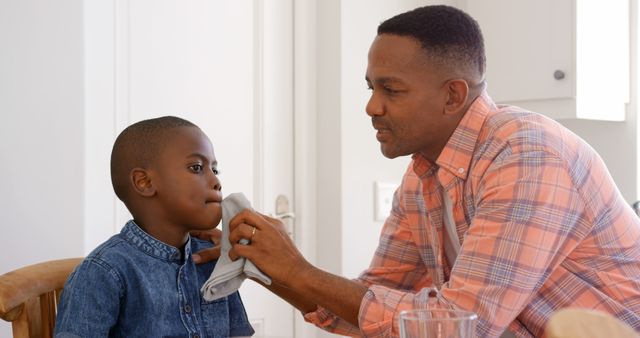 Father Caring for Young Son at Home, Teaching Hygiene - Download Free Stock Images Pikwizard.com