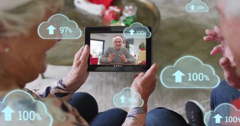 Elderly couple video calling for festive celebration