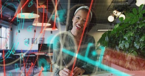 Smiling Professional Engaged in Creative Office Work