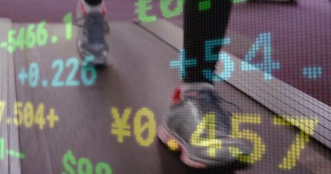 Jogging on Treadmill with Digital Stock Market Display Overlay
