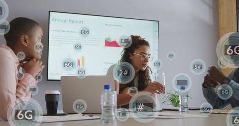 Diverse Team Analyzing 6G Annual Report in Modern Office