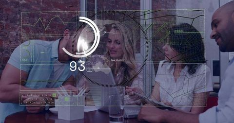 Diverse team collaborating over tablet with augmented reality HUD and analytics charts