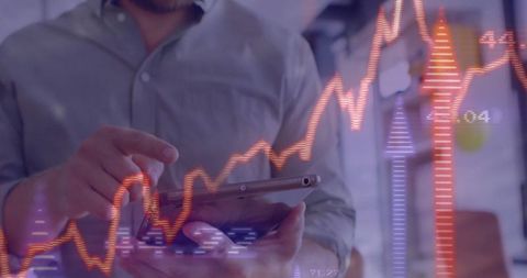 Businessperson Analyzing Financial Data on Tablet with Stock Graph Overlay