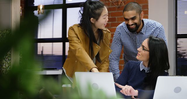 Multiracial Team Collaborating on Project in Modern Office - Download Free Stock Images Pikwizard.com