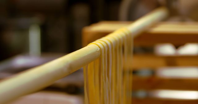 Homemade Pasta Drying on Wooden Rack in Artisan Bakery - Download Free Stock Images Pikwizard.com