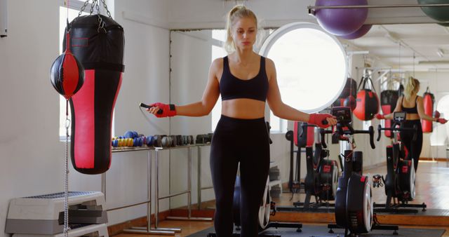 Woman Skipping Rope During Workout in Gym - Download Free Stock Images Pikwizard.com