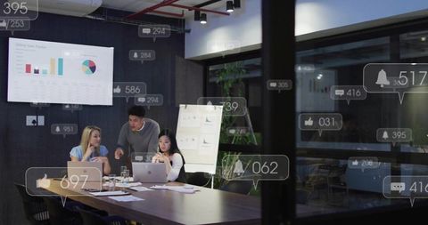 Professionals analyzing sales data in modern boardroom meeting