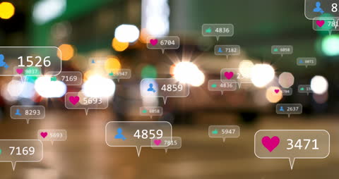 Social Media Icons Hovering Over Blurry City Lights