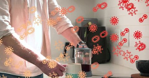 Brewing french press coffee at home with microbe contamination concept in sunlit kitchen