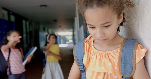Sad Schoolgirl by Lockers Facing Bullying and Isolation - Download Free Stock Images Pikwizard.com