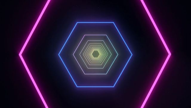 Glowing concentric neon hexagons with multicolored depth