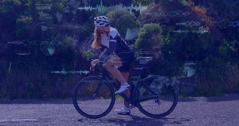 Female Cyclist Riding Road Bike with Data Visualization Overlays for Fitness Technology