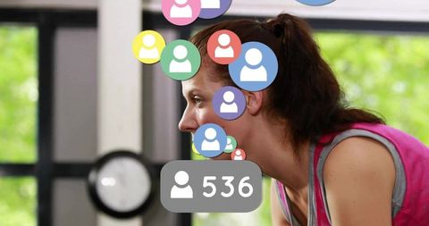 Focused Athlete Surrounded by Social Notifications in Gym