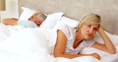 Upset Mature Couple with Communication Breakdown in Bed - Download Free Stock Images Pikwizard.com