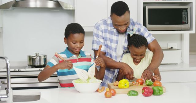 African American Family Cooking Together in Modern Kitchen - Download Free Stock Images Pikwizard.com