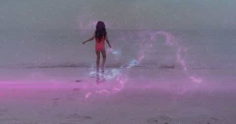 Child gazing at misty seashore with dreamlike neon nebula and trailing footprints at dawn