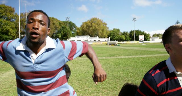 Rugby Players Running Excitedly on Outdoor Field - Download Free Stock Images Pikwizard.com