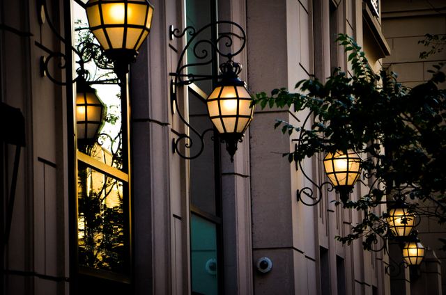 Row of Elegant Lanterns on Urban Building at Sunset - Download Free Stock Photos Pikwizard.com