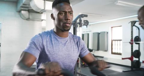 Focused workout session with african american athletes at modern gym